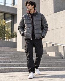 PARVANO puffer jacket in charcoal grey — full front styling view