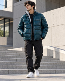PARVANO puffer jacket in deep teal — full front styling view